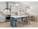 Bright kitchen features a large island with seating and stainless steel appliances at 716 Triangle Ln, Summerville, SC 29486