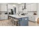 Spacious kitchen island with ample seating and modern appliances for a gourmet cooking experience at 716 Triangle Ln, Summerville, SC 29486