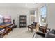 Living room features an entertainment center, a bookcase, and two leather chairs at 716 Triangle Ln, Summerville, SC 29486