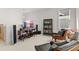 Living room features an entertainment center, an entertainment center, and two black leather chairs at 716 Triangle Ln, Summerville, SC 29486