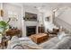 Cozy living room featuring a fireplace, comfortable seating, and a modern ceiling fan at 716 Triangle Ln, Summerville, SC 29486