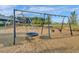 A community playground with swings, climbing structures, and soft ground covering at 716 Triangle Ln, Summerville, SC 29486