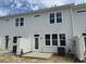 Back of the home with backyard patio and door leading into the home at 760 Blueway Ave, Summerville, SC 29486