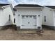Detached white garage with black hardware at 760 Blueway Ave, Summerville, SC 29486