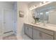 Elegant bathroom featuring double vanity sinks, marble countertops, and marble tiled floors at 802 S Pointe Blvd, Summerville, SC 29483