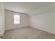 This bedroom features neutral walls, carpet and a window providing bright, natural light at 802 S Pointe Blvd, Summerville, SC 29483