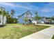 Charming two-story home with a well-maintained lawn, mature trees, and inviting curb appeal at 802 S Pointe Blvd, Summerville, SC 29483