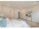 Bright main bedroom featuring decorative pillows, light hardwood floors, and modern décor accents at 802 S Pointe Blvd, Summerville, SC 29483