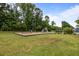 Large playground featuring swings, slides, and play structures, perfect for outdoor activities at 8402 Loggers Run, North Charleston, SC 29420