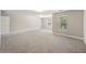 The finished basement has plush carpeting and windows providing lots of natural light at 9019 Parlor Dr, Ladson, SC 29456