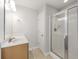 Bathroom with a vanity sink, sliding glass door shower and tiled floors at 9019 Parlor Dr, Ladson, SC 29456