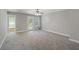 Large, open bedroom with lots of natural light and access to an outdoor balcony at 9019 Parlor Dr, Ladson, SC 29456