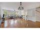 Bright living room with hardwood floors, neutral decor, and ample natural light at 9019 Parlor Dr, Ladson, SC 29456