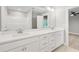 Elegant bathroom featuring double sinks, quartz countertops, and a large mirror at 924 Trent St, Charleston, SC 29414