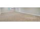 Spacious carpeted bedroom with modern trim, a window, and a neutral color palette at 924 Trent St, Charleston, SC 29414