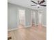 Open bedroom that connects to a walk in closet and bath; hardwood floors and neutral tones at 924 Trent St, Charleston, SC 29414