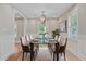 Elegant dining room with a glass-top table, stylish chairs, and modern decor at 924 Trent St, Charleston, SC 29414
