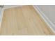 Close-up of the light hardwood flooring and molding at 924 Trent St, Charleston, SC 29414