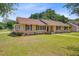 Attractive brick home featuring a well-kept lawn and tasteful landscaping for great curb appeal at 924 Trent St, Charleston, SC 29414