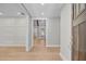 Inviting hallway with wood floors that provides a glimpse into the home's spacious layout and design at 924 Trent St, Charleston, SC 29414