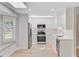Modern kitchen with stainless steel appliances, light countertops, and a window for ample natural light at 924 Trent St, Charleston, SC 29414
