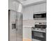 Stylish kitchen showcasing stainless steel appliances, white cabinets, and bright subway tile backsplash at 924 Trent St, Charleston, SC 29414