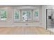 Inviting living space featuring a bay window with built-in seating and hardwood floors at 924 Trent St, Charleston, SC 29414