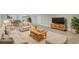 Inviting living room features neutral tones, a cozy seating area, and a dining space with natural light at 924 Trent St, Charleston, SC 29414