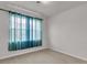 Bedroom with a window and blue curtains at 9998 Winged Elm St, Ladson, SC 29456