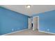 Blue bedroom with carpet and closet space at 9998 Winged Elm St, Ladson, SC 29456