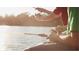 Enjoy fishing with Gathering in the community's serene lake at sunset at 1013 Swamp Rose Run, Summerville, SC 29485