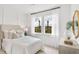Bright bedroom with white walls, large windows, and stylish décor offering a comfortable and serene space at 104 Snow St, Summerville, SC 29486