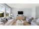 Comfortable living room with plush seating and views from a bright window at 104 Snow St, Summerville, SC 29486