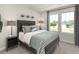 This cozy bedroom has two large windows for lots of natural light at 105 Indigo Cove Blvd, Summerville, SC 29486