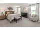 Serene main bedroom featuring neutral décor, plush carpet, and bright natural light at 105 Indigo Cove Blvd, Summerville, SC 29486