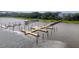 Aerial shot of docks and waterways leading to modern buildings with the river at 108 Fairbanks Oak Aly # 201, Charleston, SC 29492