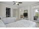Bedroom featuring two twin beds, access to a walk-in closet and full bathroom at 108 Fairbanks Oak Aly # 201, Charleston, SC 29492
