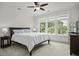 Bright bedroom with large windows and ceiling fan at 108 Fairbanks Oak Aly # 201, Charleston, SC 29492