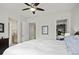 Bedroom featuring a ceiling fan, closet and ensuite bathroom at 108 Fairbanks Oak Aly # 201, Charleston, SC 29492