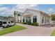 The Dime Eatery modern exterior, lush landscaping, and inviting entrance at 108 Fairbanks Oak Aly # 201, Charleston, SC 29492