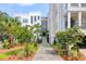 Inviting front entrance with landscaped walkway and staircase to building at 108 Fairbanks Oak Aly # 201, Charleston, SC 29492