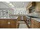 Gourmet kitchen with granite counters, stainless steel appliances, and custom cabinetry at 108 Fairbanks Oak Aly # 201, Charleston, SC 29492