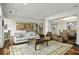 Spacious living room flows seamlessly into a dining area and open kitchen, perfect for entertaining guests at 108 Fairbanks Oak Aly # 201, Charleston, SC 29492