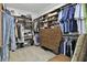 Spacious walk-in closet with custom shelving and ample storage space at 108 Fairbanks Oak Aly # 201, Charleston, SC 29492