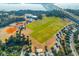 Beautiful aerial view of recreational community with baseball field and bridge at 108 Fairbanks Oak Aly # 302, Daniel Island, SC 29492