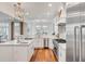 Bright and spacious kitchen with hardwood floors, stainless steel appliances, and marble countertops at 108 Fairbanks Oak Aly # 302, Daniel Island, SC 29492