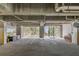 Well-lit parking garage with marked spaces and secure gated access at 108 Fairbanks Oak Aly # 302, Daniel Island, SC 29492