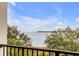 Scenic water view from the balcony, showcasing the peaceful surroundings and lush greenery at 108 Fairbanks Oak Aly # 302, Daniel Island, SC 29492