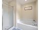 Bathroom with shower, soaking tub, and modern fixtures at 110 Moon Shadow Ln, Summerville, SC 29485