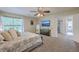 Spacious bedroom with a ceiling fan, and ensuite bathroom at 110 Moon Shadow Ln, Summerville, SC 29485